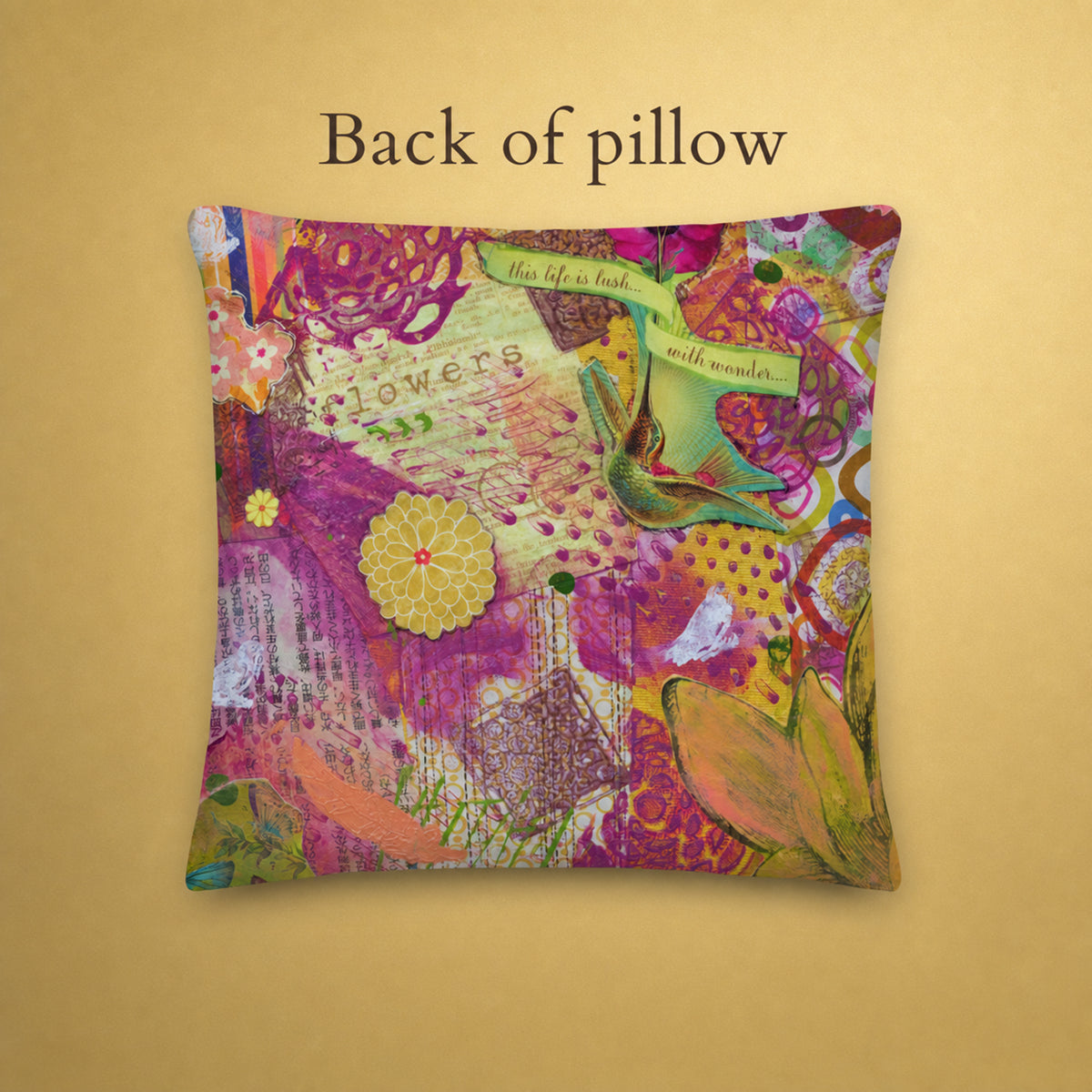 A square decorative pillow shown from the back on a warm beige background, with the text 'Back of pillow' above it. The pillow features a highly detailed, colorful abstract floral and botanical collage print with purple, pink, yellow, green, and orange tones.