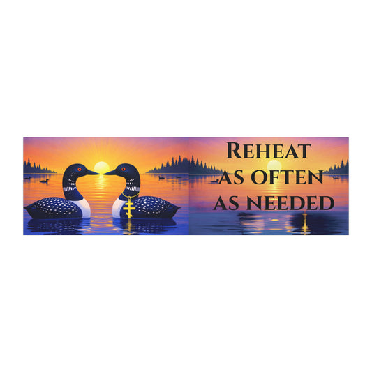 A rectangular car bumper magnet with a sunset lake scene featuring two loons and the text 'REHEAT AS OFTEN AS NEEDED' on a white background.