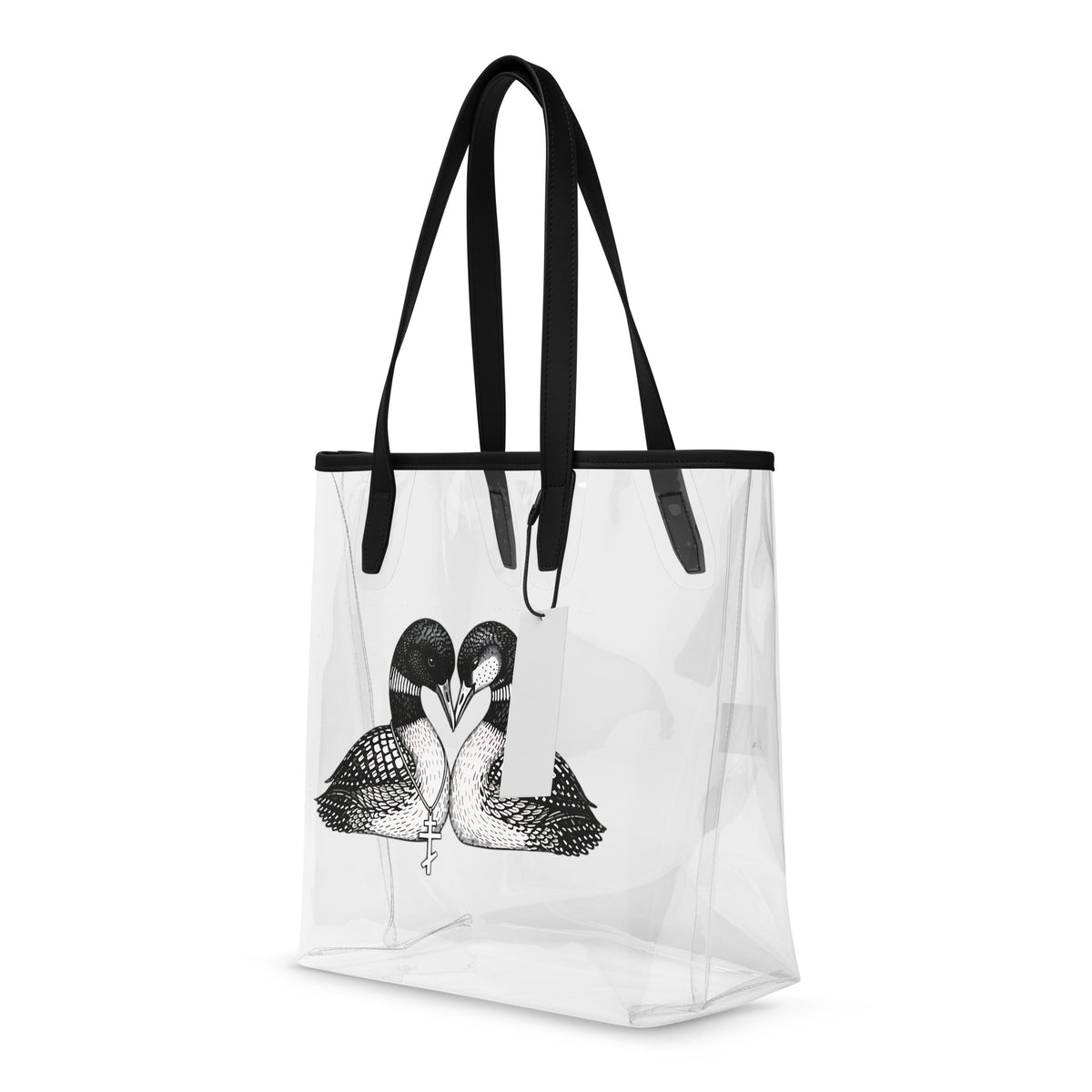Clear tote bag with black handles and a design of two loons forming a heart shape on a white background