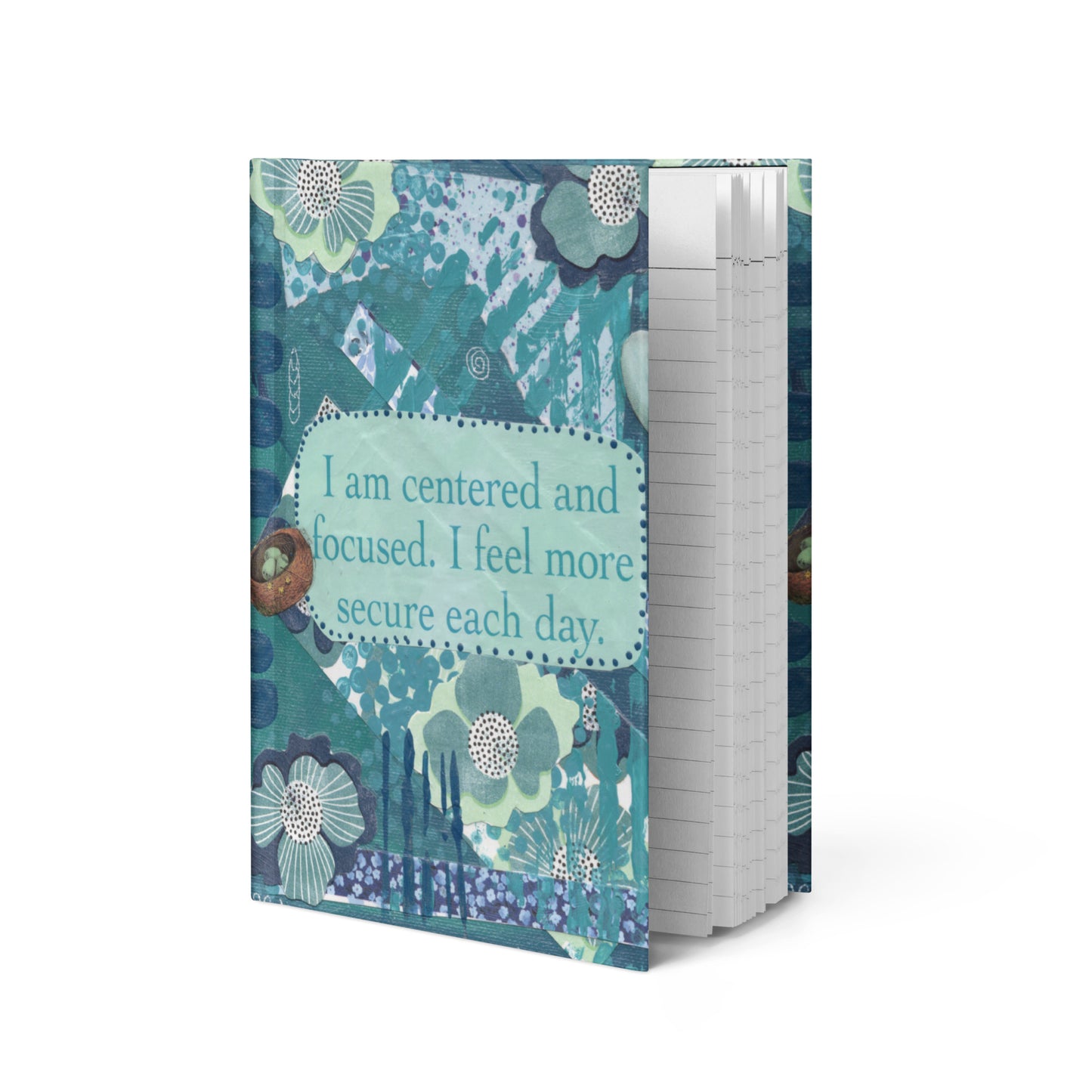 The blue floral self worth journal standing up with a view of the inside pages that are lined.