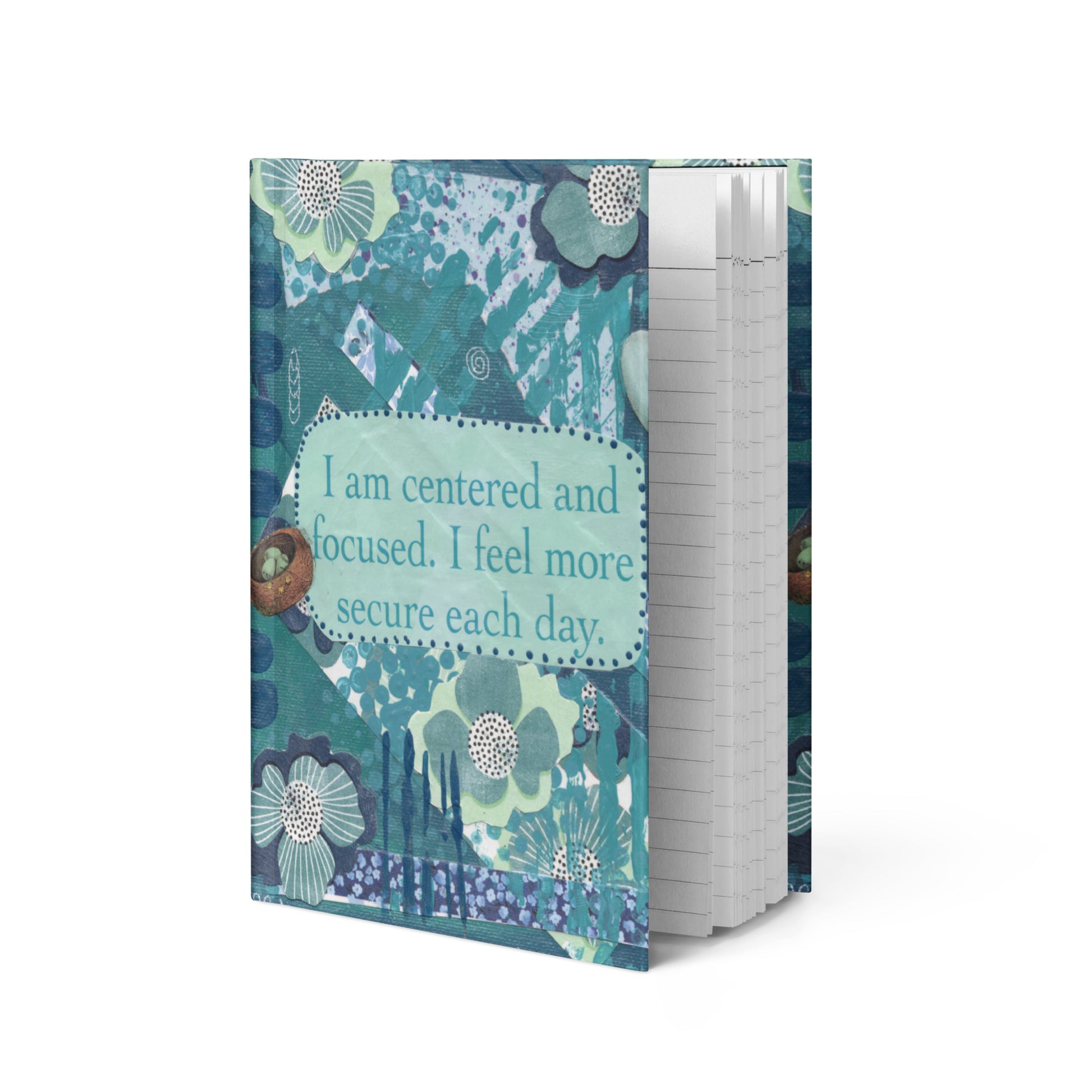The blue floral self worth journal standing up with a view of the inside pages that are lined.