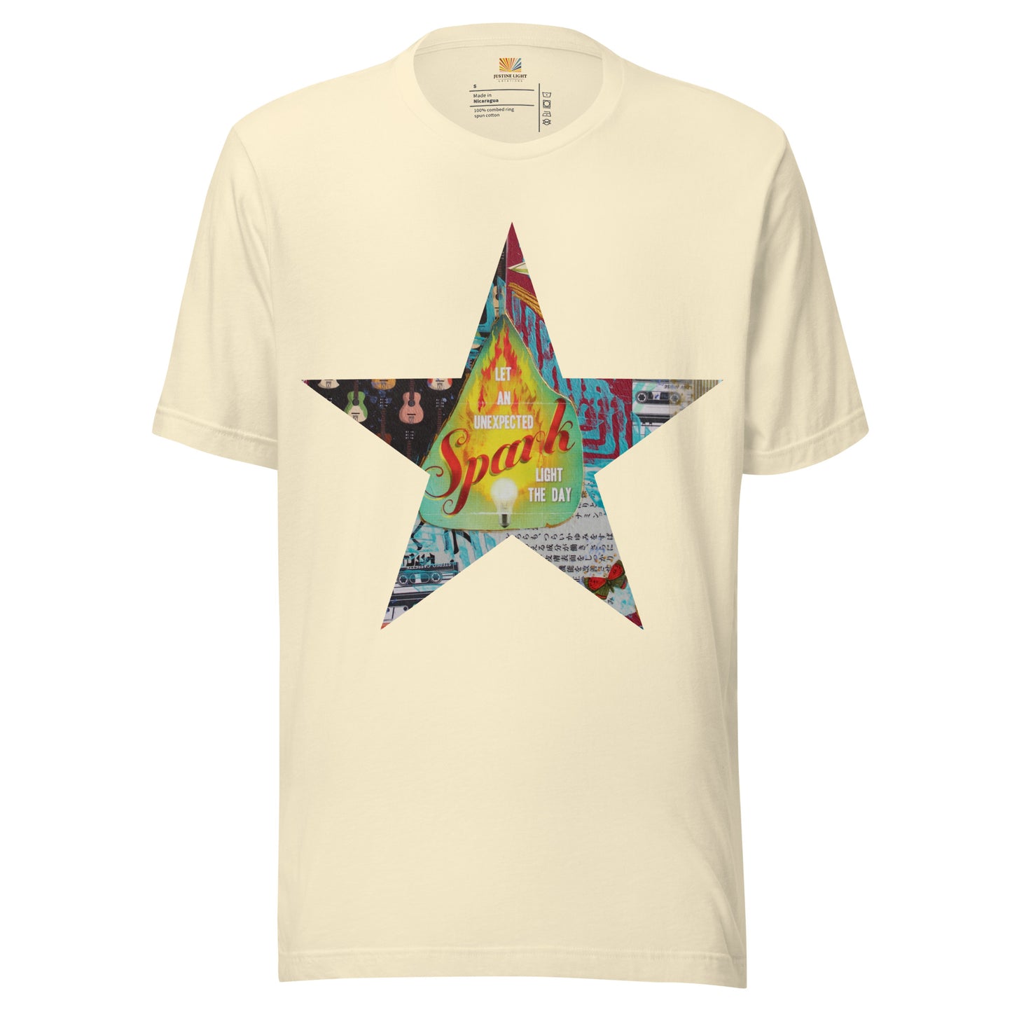 Star tee shirt in natural with a colorful mixed-media star design and the words spark of inspiration on a soft unisex t shirt.
