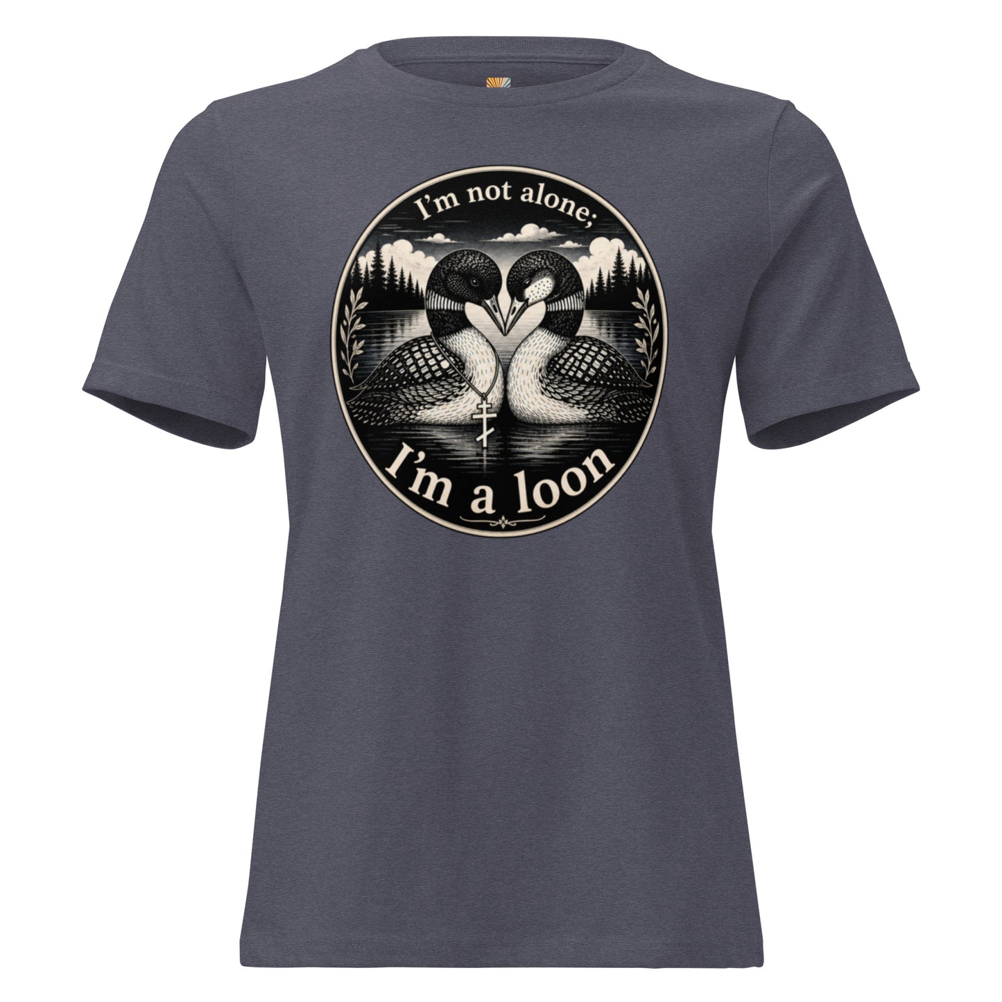 A graphic tee for women in heather navy featuring a circular graphic print of two loons facing each other in water, with the text 'I'm not alone; I'm a loon' in white lettering.